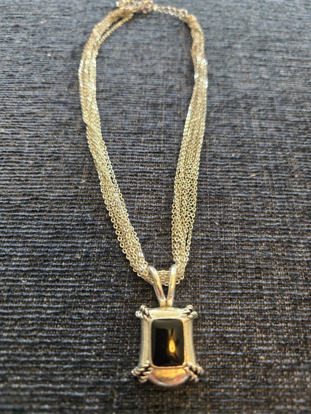 10 String Silver chain with a Black rectangular Pendant